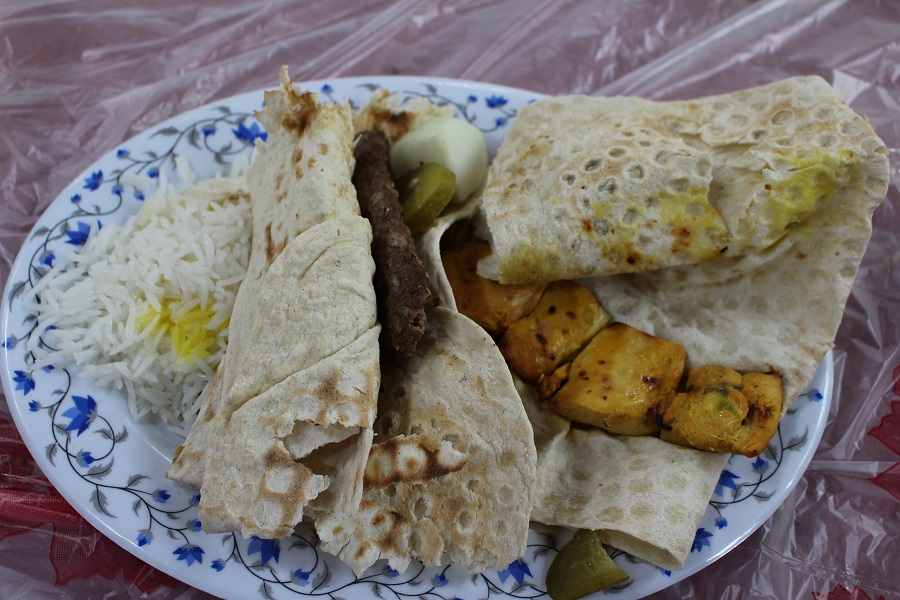 Lamb and chicken kabab with bread and rice. Author and Copyright Marco Ramerini
