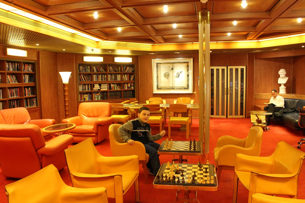 Andrea in the ship's library. Author and Copyright Marco Ramerini